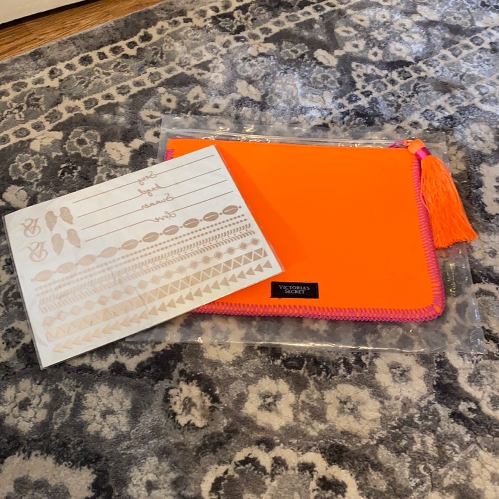 Victoria’s Secret zipper tablet case and tattoos